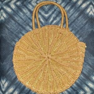 Gold and tan round straw bag